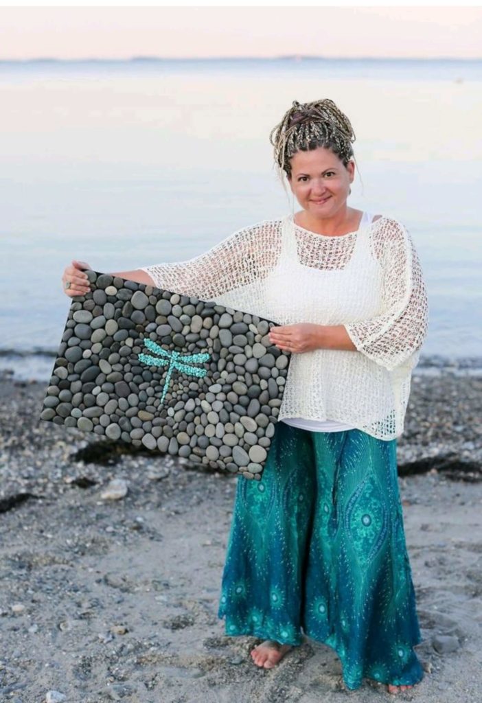 Lisa from Gaias Ground with a gounding mat.
